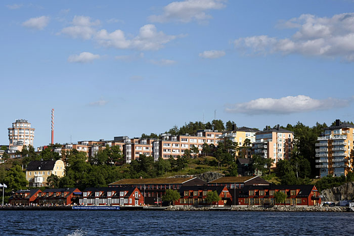 Traditionelle H&auml;user und moderne Wohnblocks